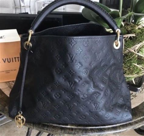 are louis vuitton bags real leather|louis vuitton real leather handbags.